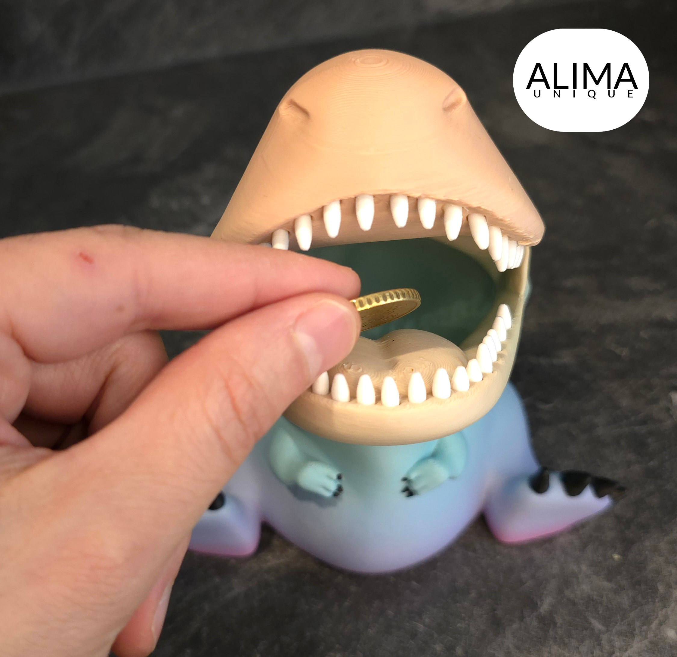 Baby dinosaur money box