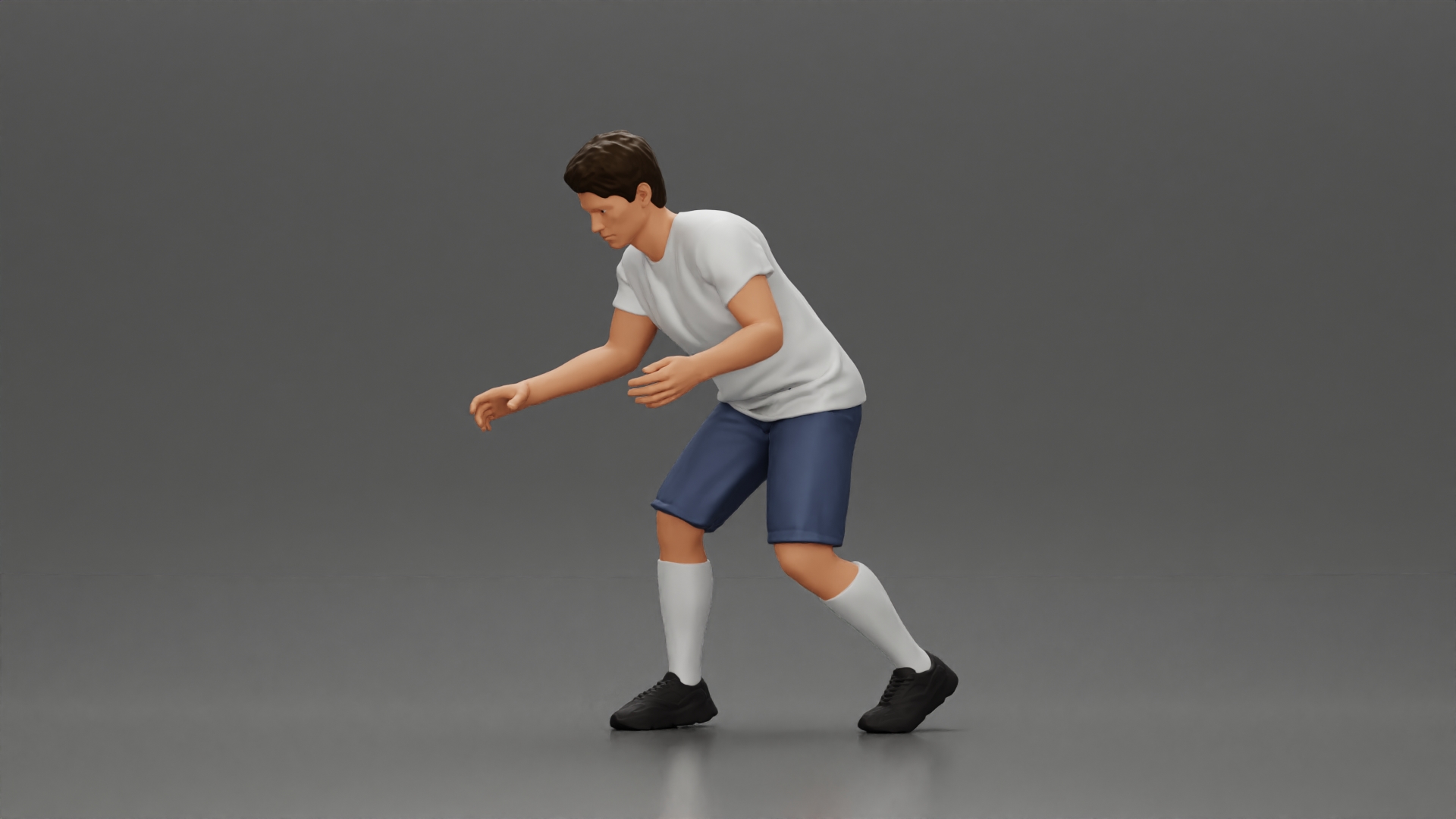 Man in shorts playing table football