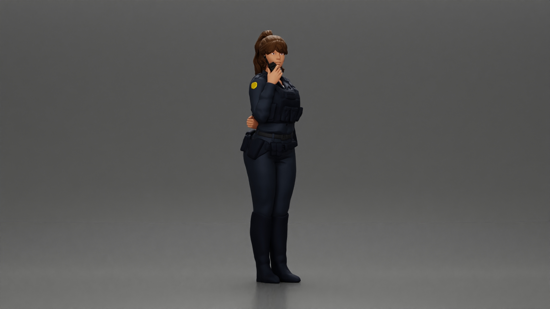 policewoman standing hand resting on her back speaking into a radio