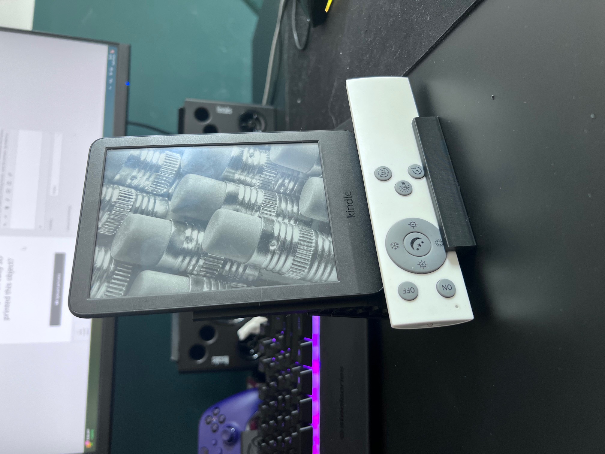 Kindle paperwhite and phone stand