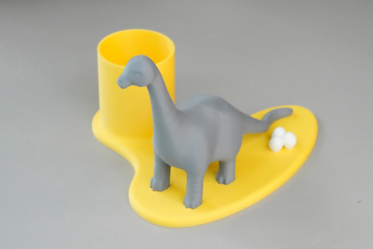 Dinosaur pen holder