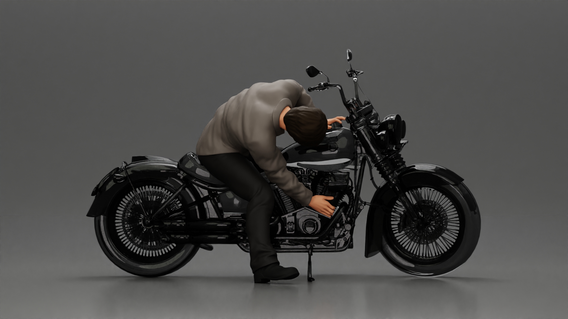 Man sitting on a vintage motorcycle, checking it for restoration