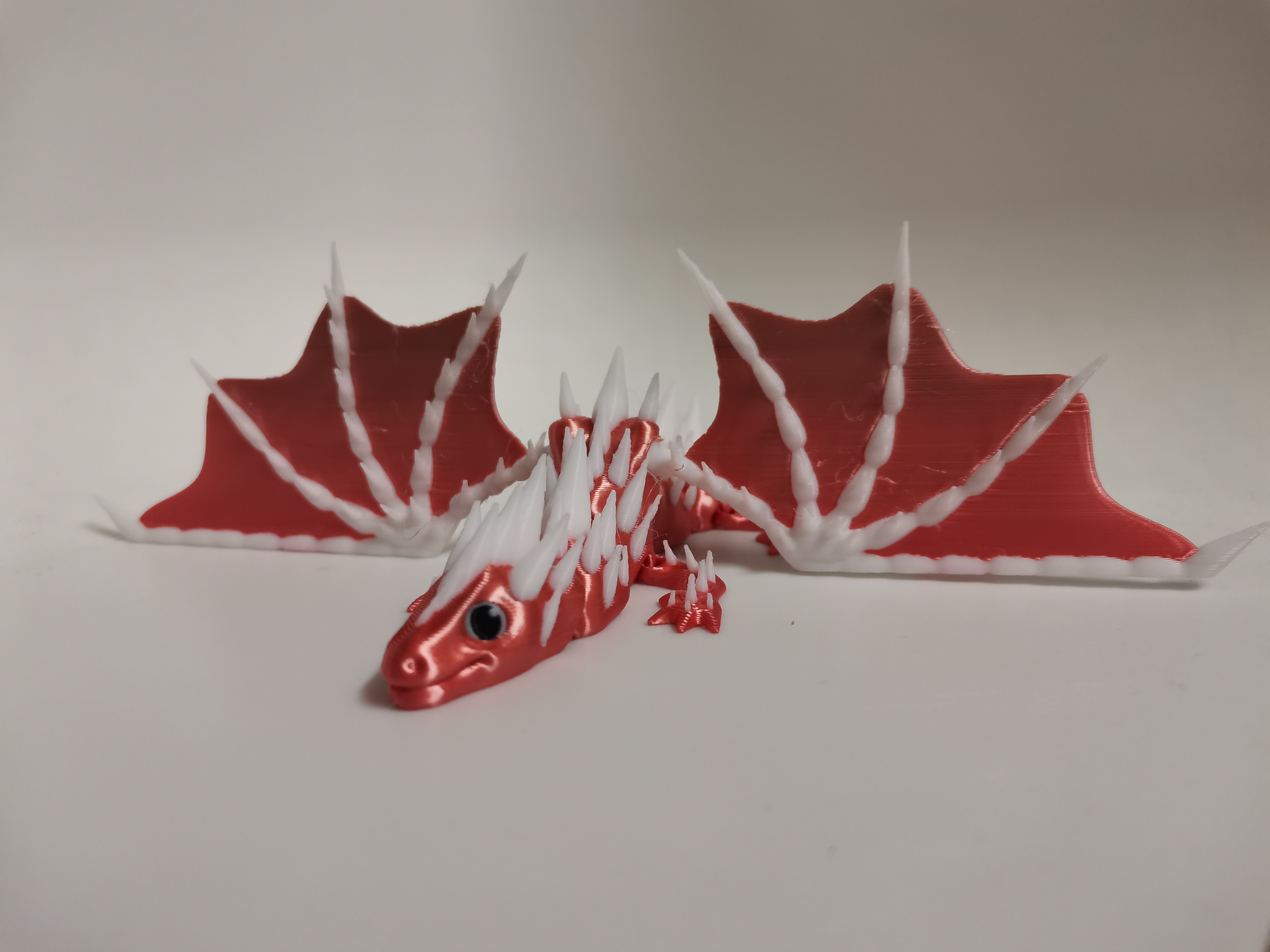Cute multicolor spikey dragon