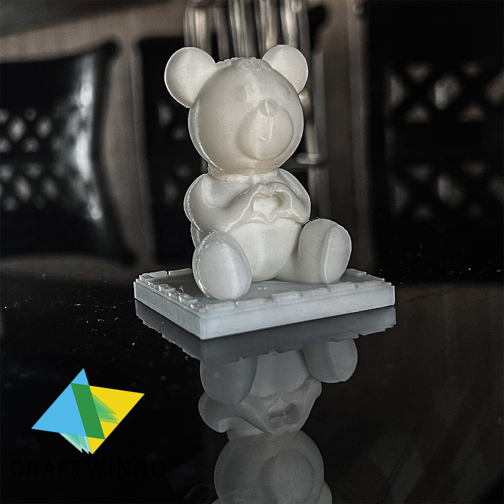 TEDDY BEAR WITH A HAND HEART