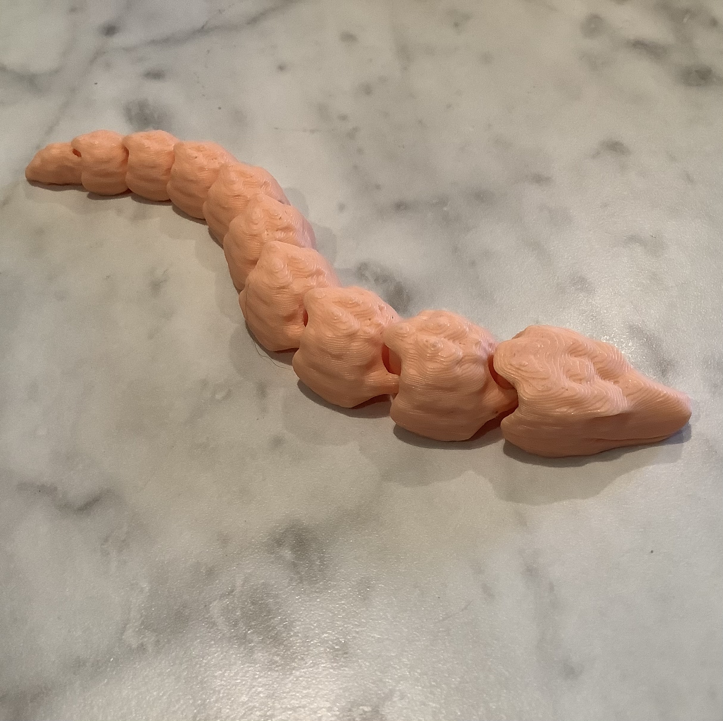 Articulated baby snake